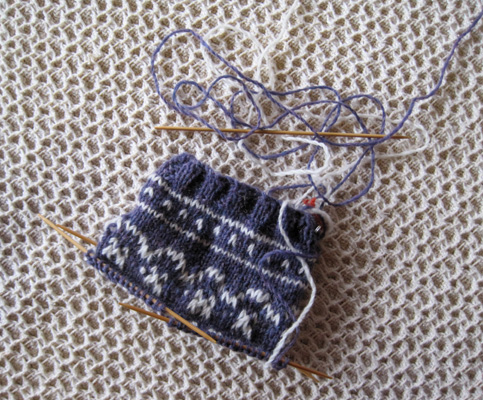 start of knitted patterned sock
