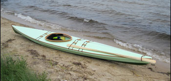 skin-on-frame mint green kayak